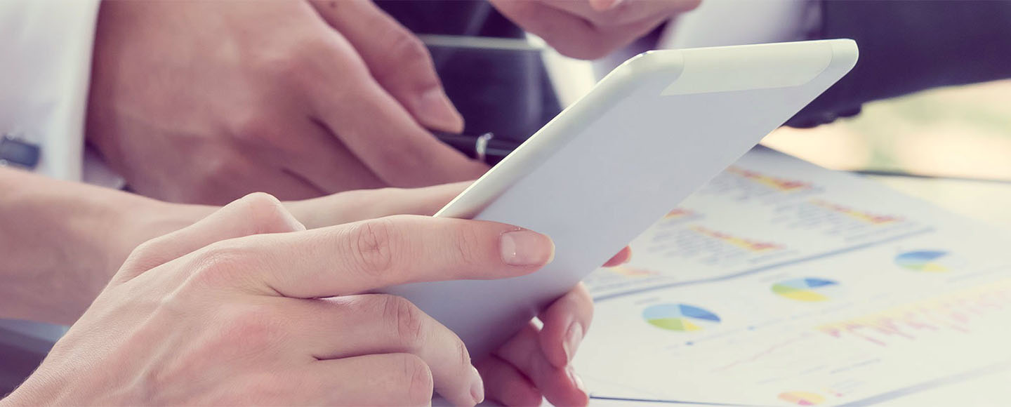 Woman holding a tablet device