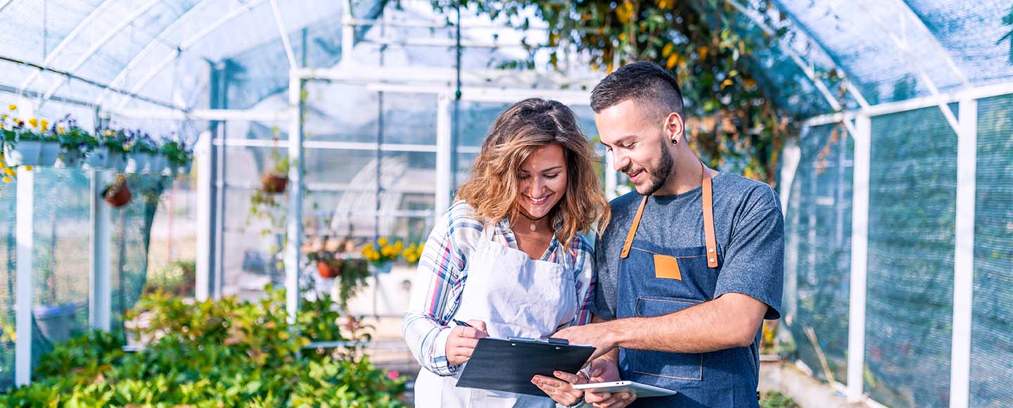 Shop workers in a greenhouse