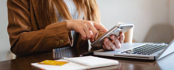 Woman using phone for banking
