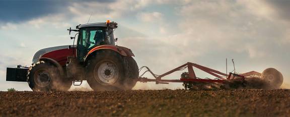 Tractor plowing a field