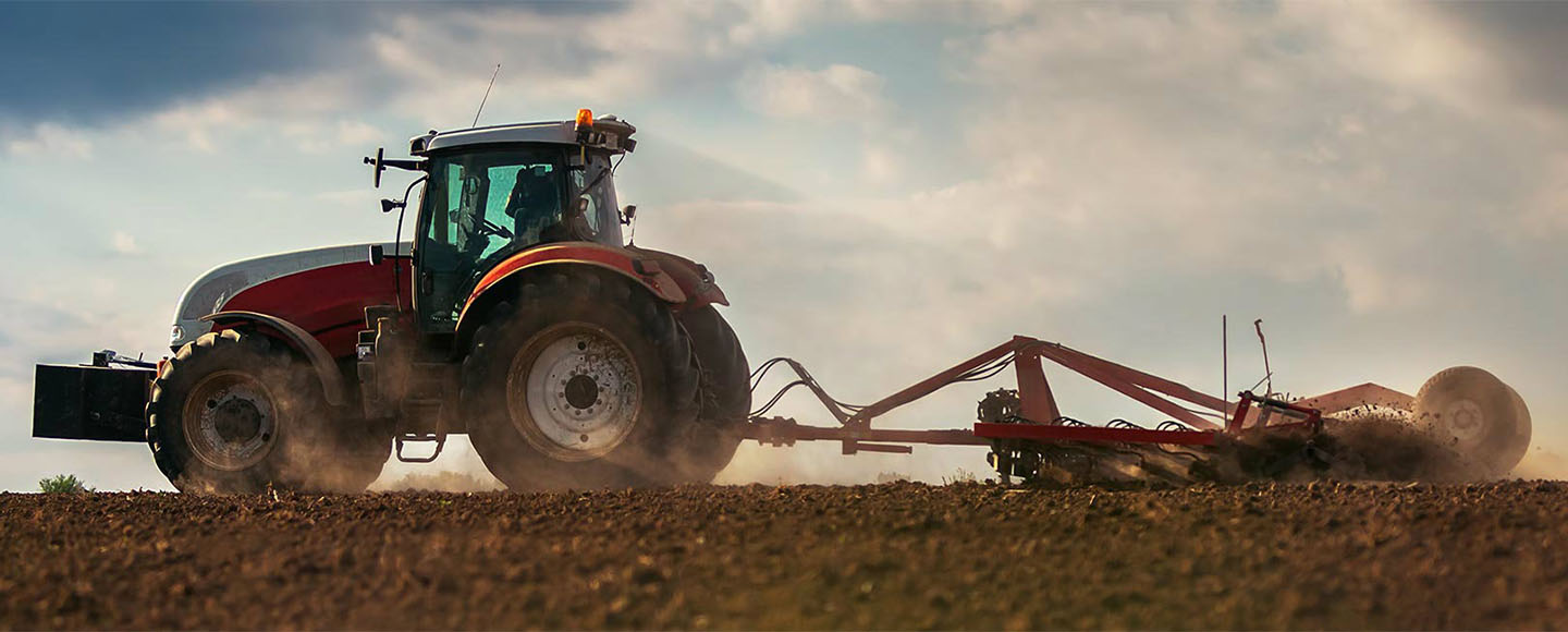 Tractor plowing a field