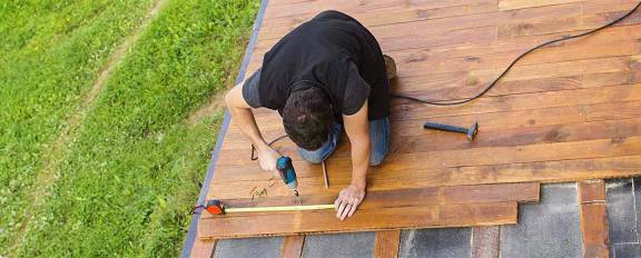 Man doing a deck installation