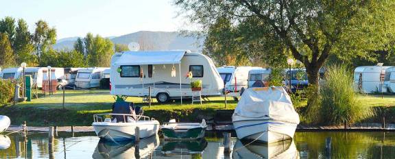 Campers on the shore of a lake