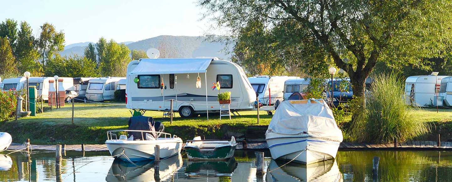 Campers on the shore of a lake